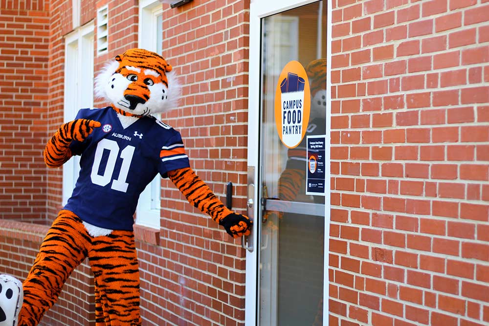 Aubie stands outside the Campus Food Pantry