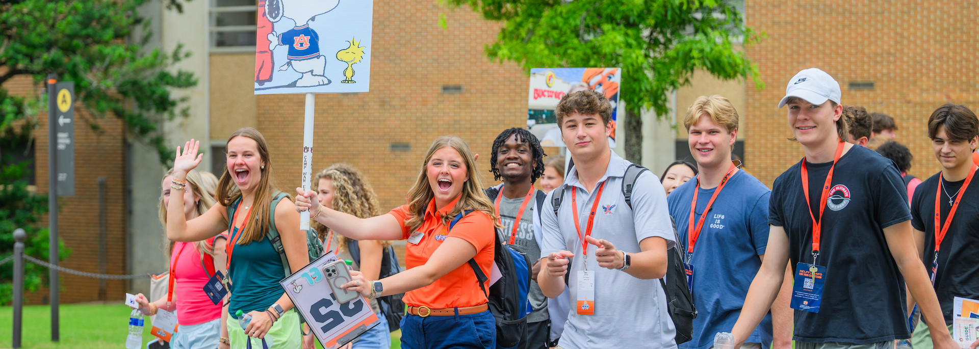 a group of camp war eagle students walking across campus