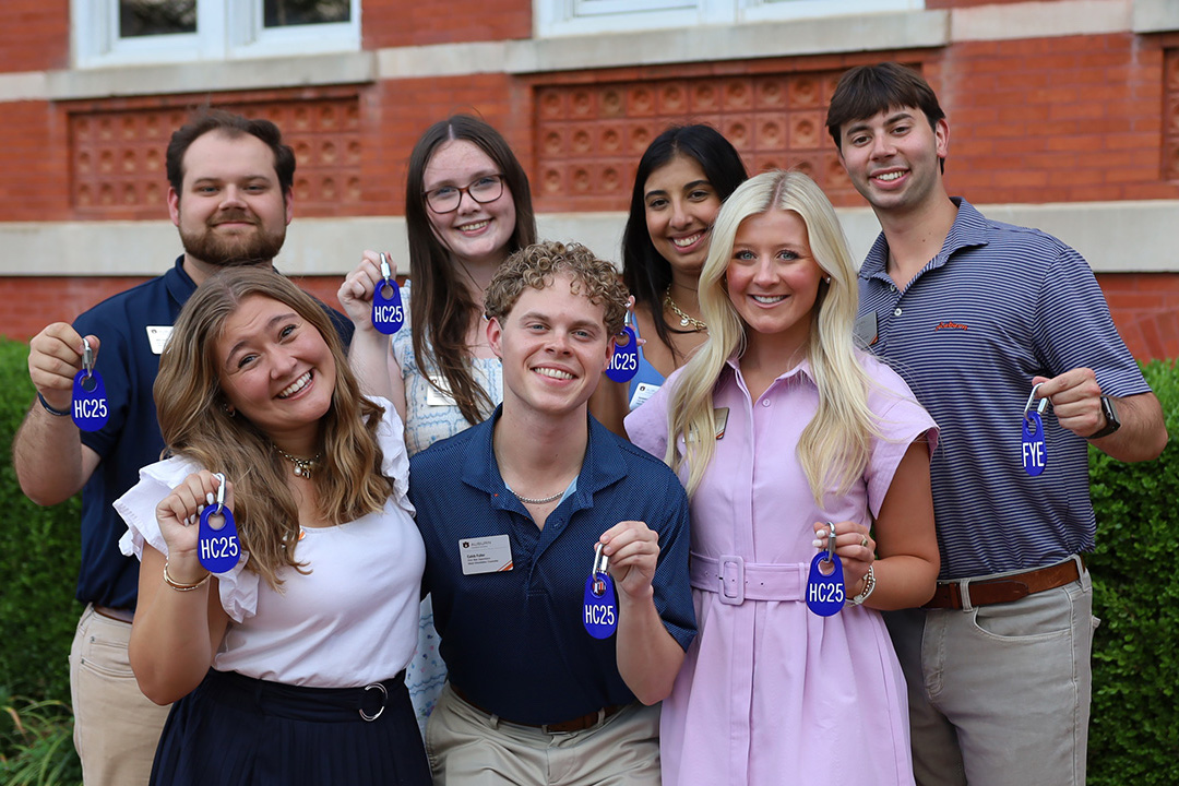 a group of camp war eagle counselors posing for a photo