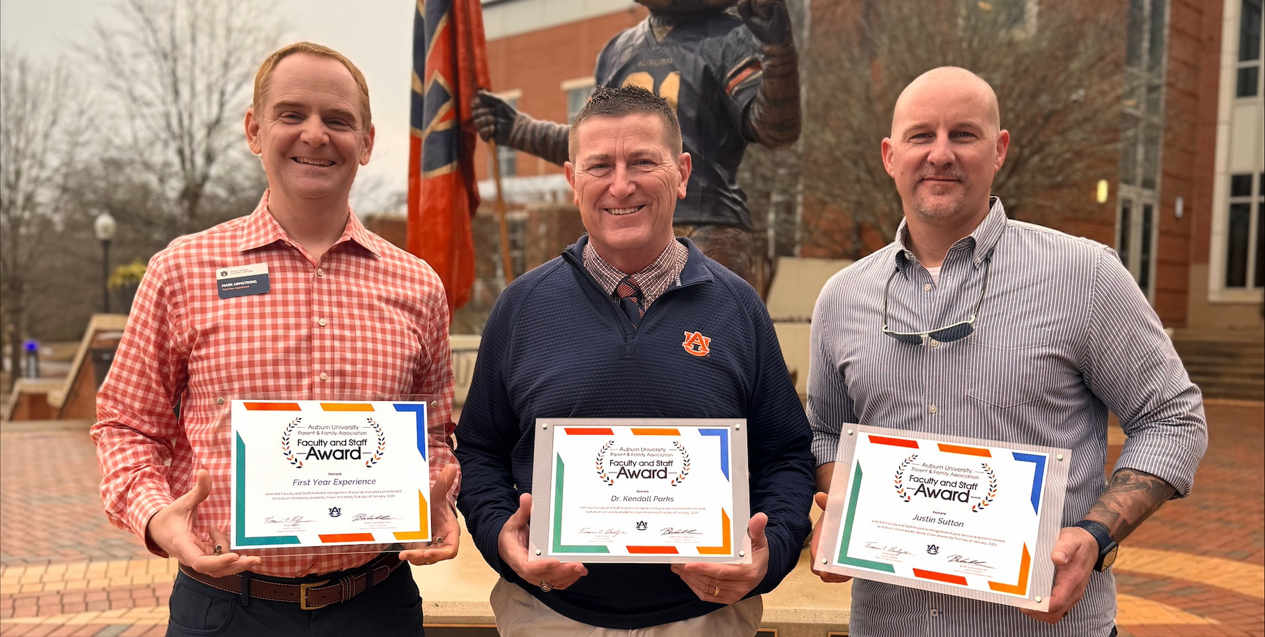 Current Faculty Staff Award winners Mark Armstrong, First Year Experience, Dr. Kendall Parks, Political Science, and Justin Sutton, Landscape Service 