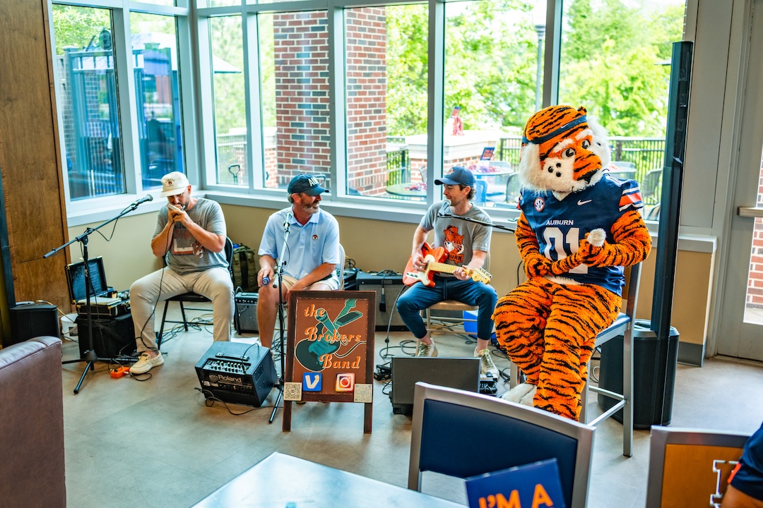 Aubie playing with a local live band