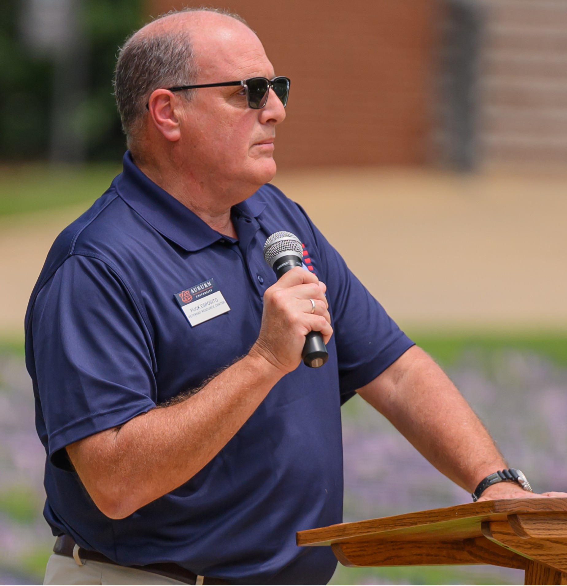 Puck Esposito speaking at an event