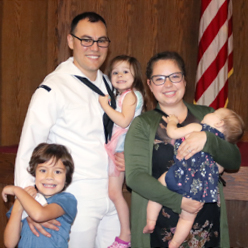 Luis Ramirez with his wife and children